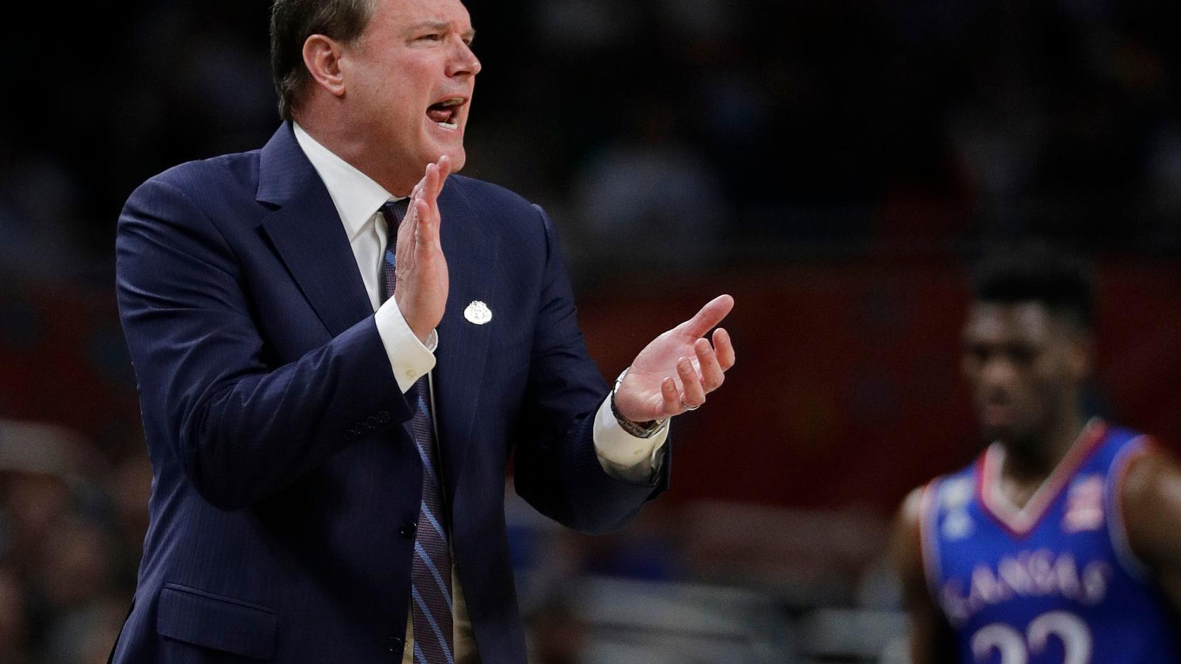 At federal trial, witness T.J. Gassnola grilled over texts to Kansas coach Bill Self